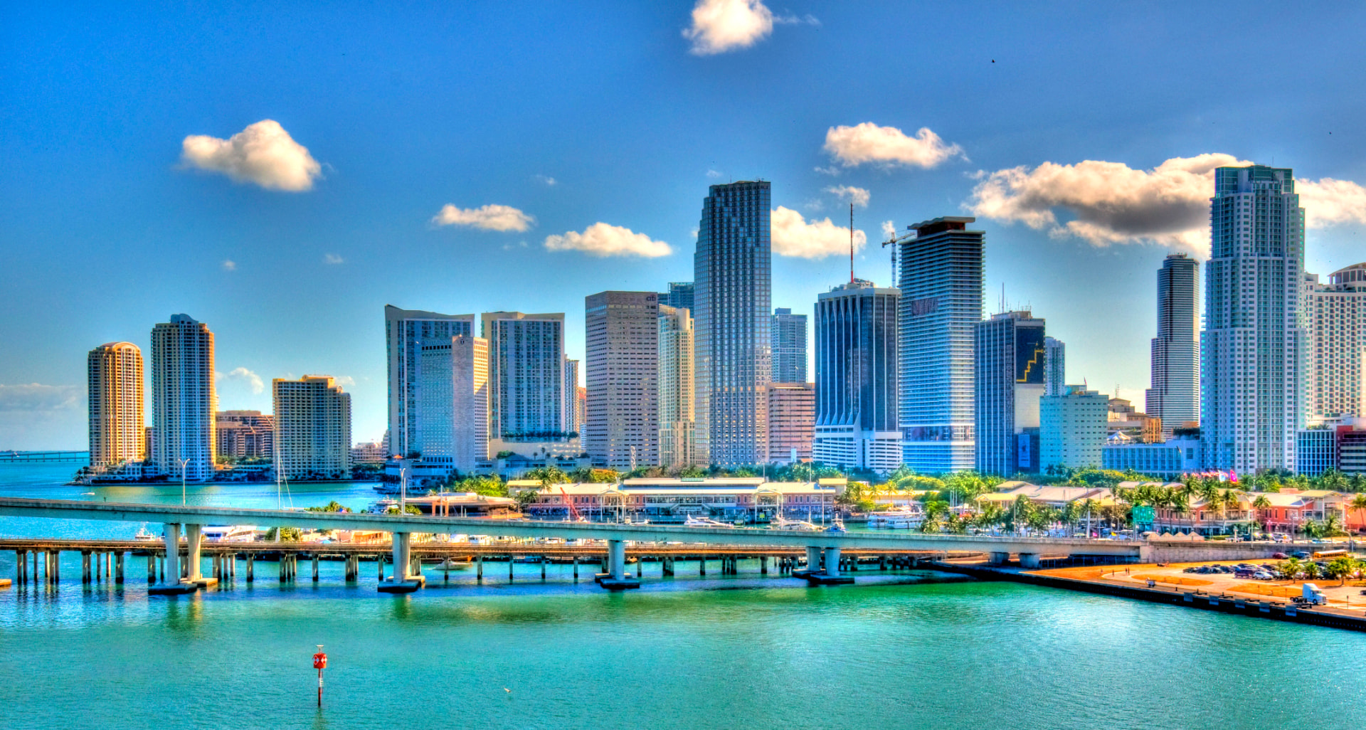 Downtown Miami skyline and turquoise Biscayne Bay on a sunny day